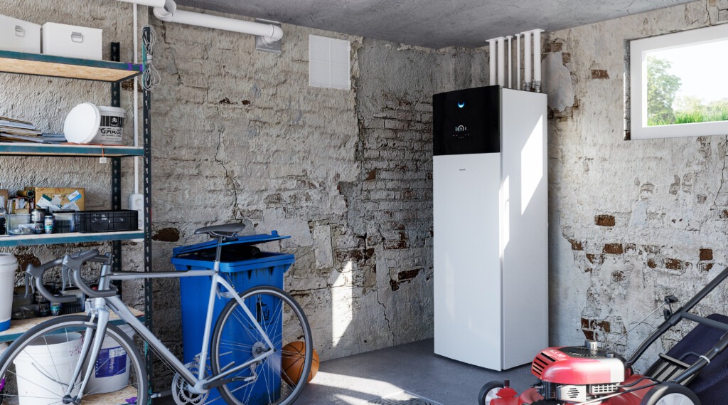 Pompe à chaleur air/eau installée dans un garage rénové – système haute performance Innovasun pour remplacement de chaudière